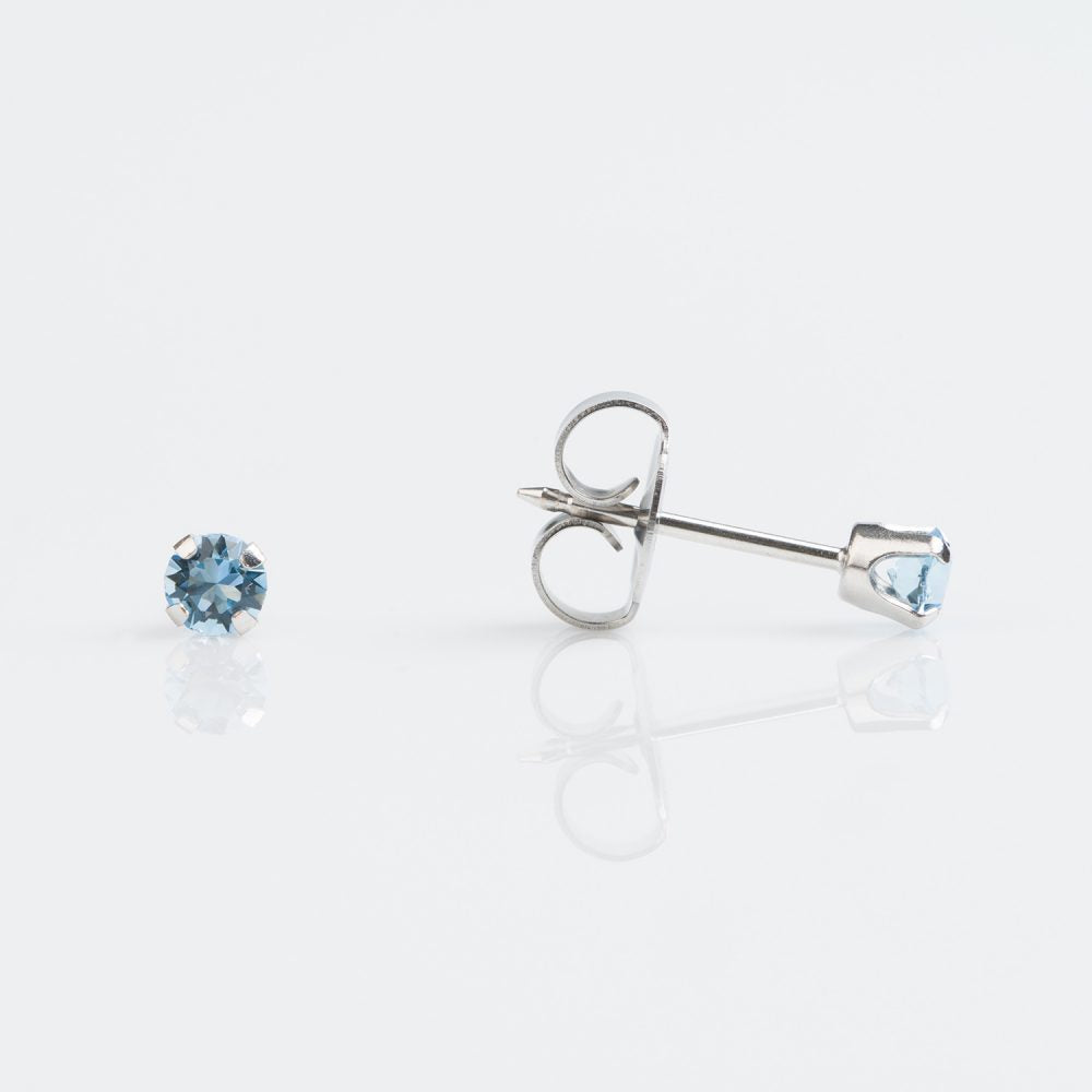 9CT WHITE GOLD TIFF. 4MM MARCH AQUAMARINE - SPARKLN