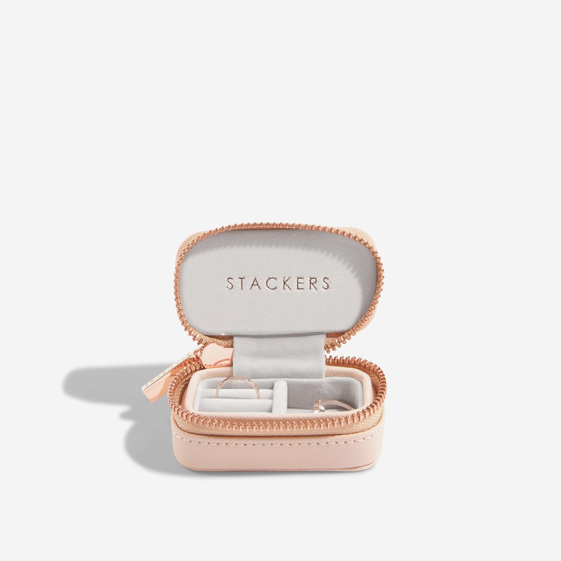 Pink jewelry case with 'Stackers' branding on a white background