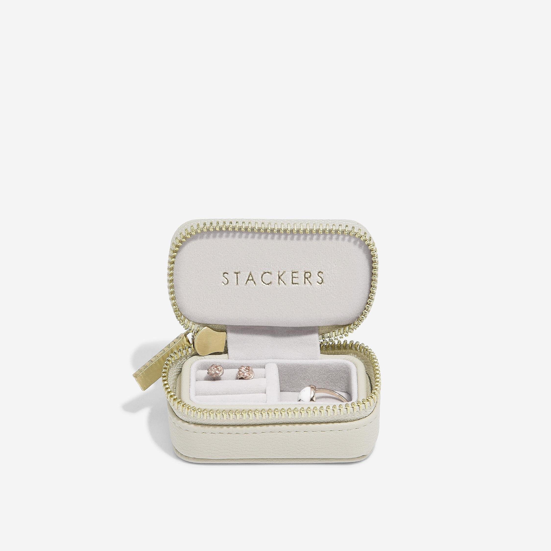Open jewelry box with 'Stackers' branding on a white background