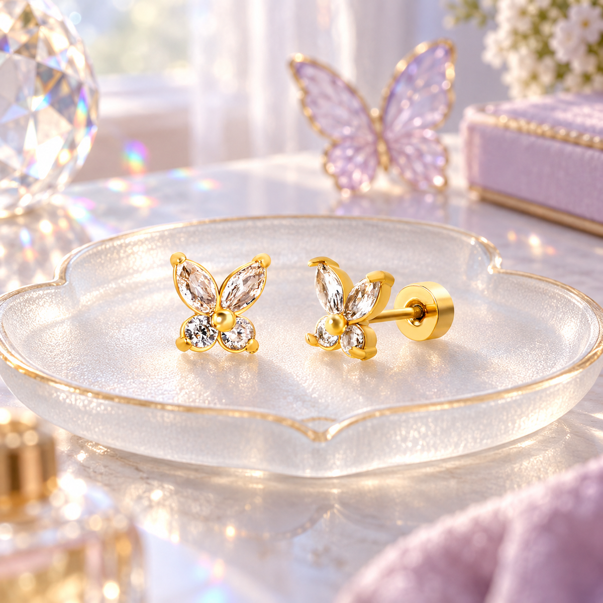 Gold crystal butterfly earrings with secure screw-on flat backs for sensitive ears