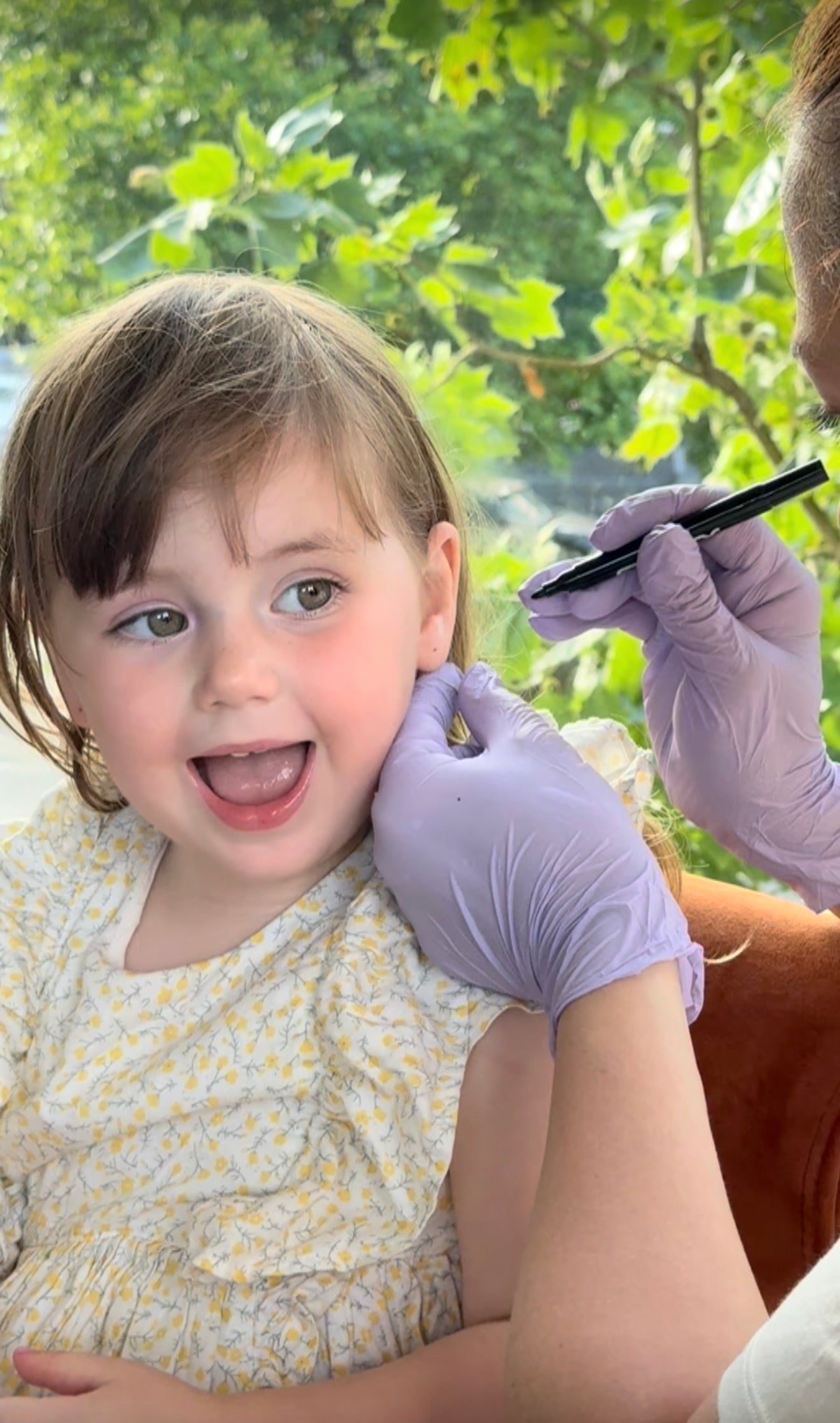 Home ear piercing for autistic children in London with a professional SPARKLN piercer, offering a calm, sensory-friendly experience in a familiar home environment.