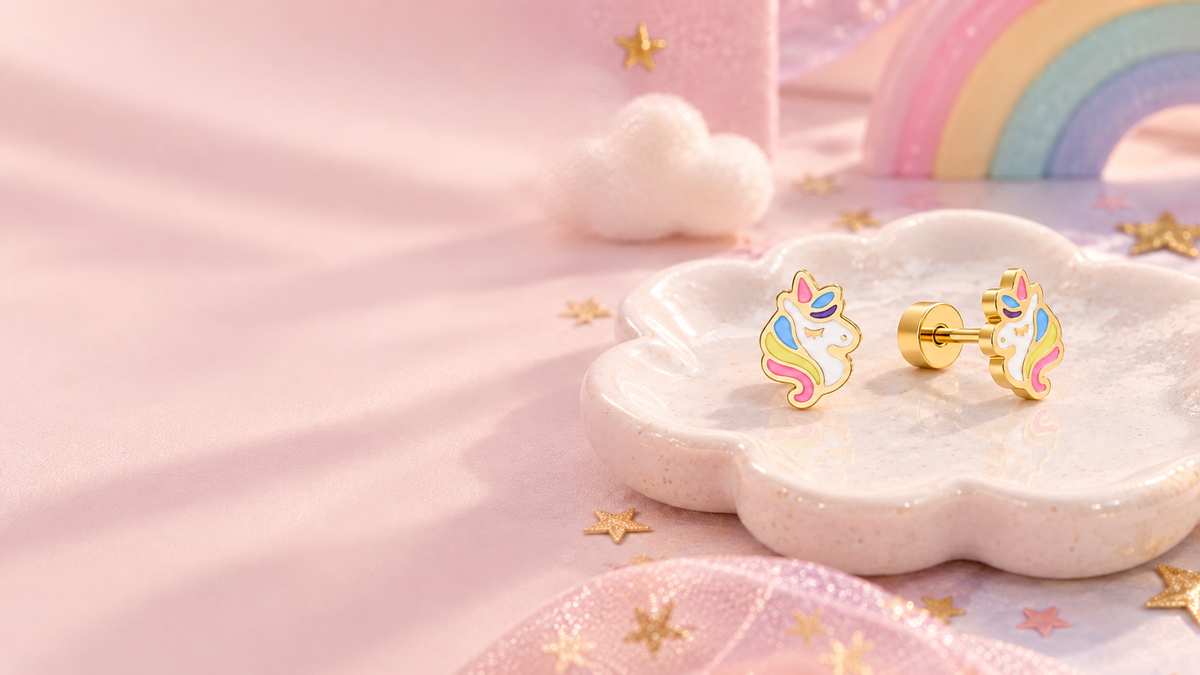 Colourful unicorn hypoallergenic flat back earrings for children displayed on a pastel jewellery tray