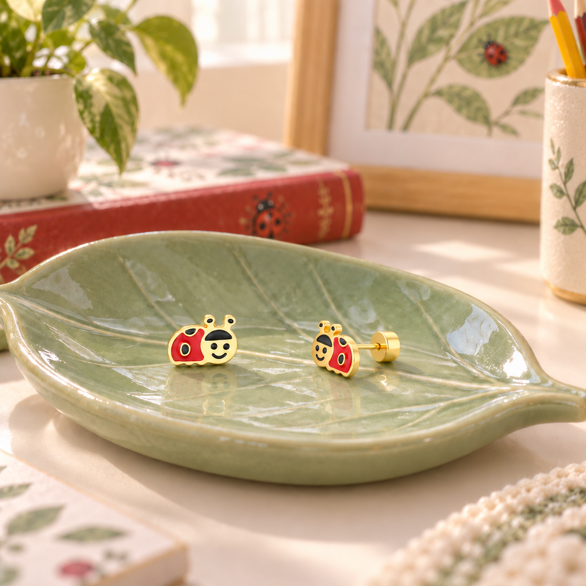 Ladybird surgical steel earrings for children with secure screw-on flat backs